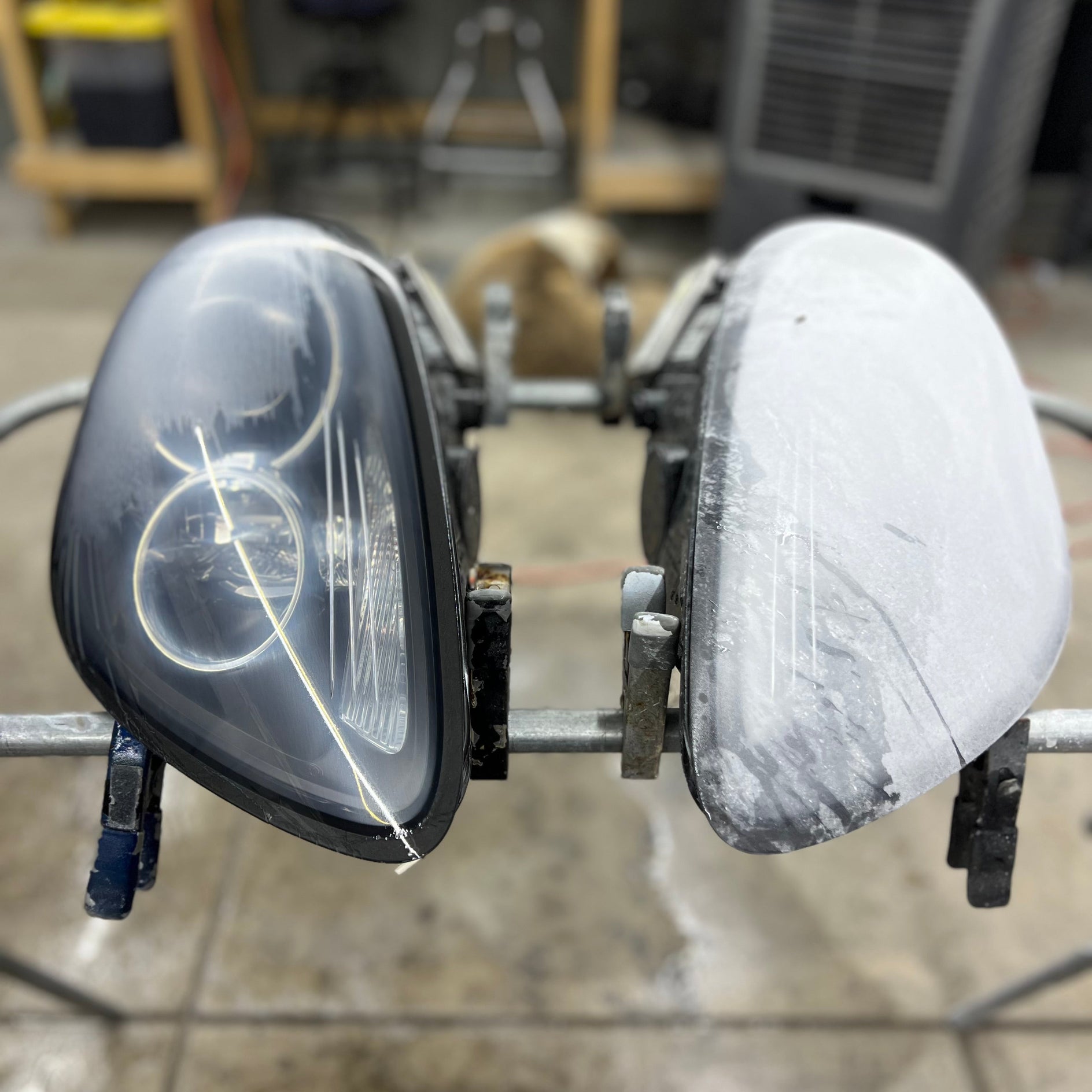 Hazy foggy Porsche headlight restored to factory clarity